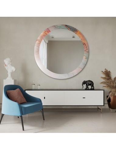 Kulaté zrcadlo na pastelovém mramoru...