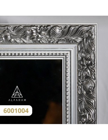 Zrcadlo v bohatém ornamentálním rámu...