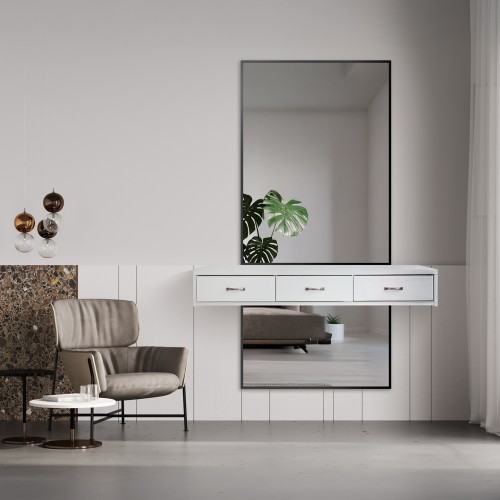 Zrcadlo v černém rámu na...