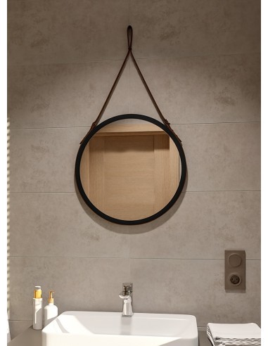 Kulaté zrcátko v černém matném rámu...