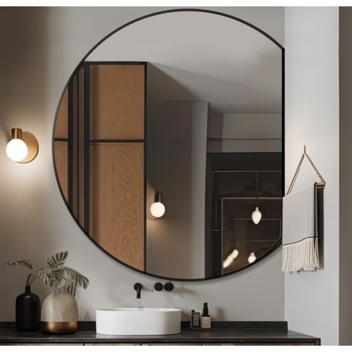 Kulaté zrcadlo v černém...